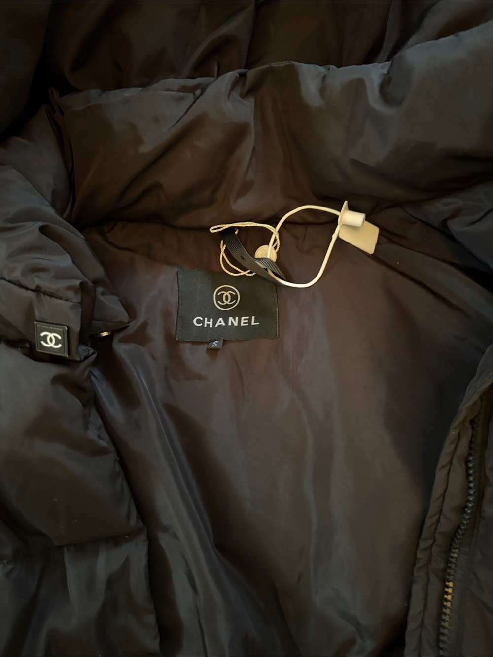 CHANEL Black Quilted Puffer Coat with Logo Trim
